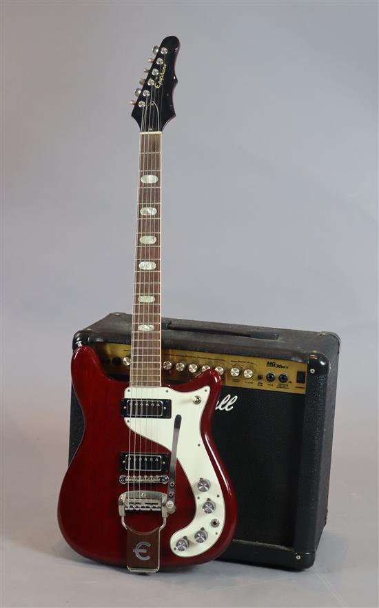 An 1966 Epiphone Crestwood Custom with original case / case candy, original strap and lead.